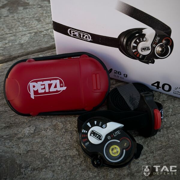Фонарь налобный со свистком PETZL E+Lite -бело-красный свет (40 люменов), TD418, изображение 7 Фонарь налобный со свистком PETZL E+Lite -бело-красный свет (40 люменов), TD418, изображение 7